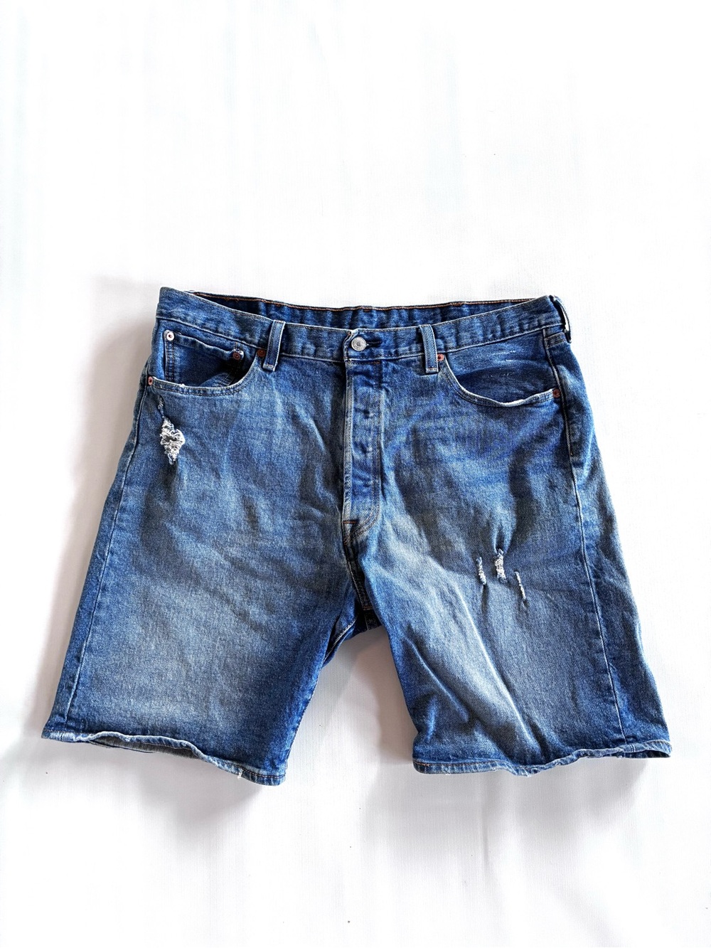 Levi's 501 9in inseam Medium Blue Ripped Denim Shorts